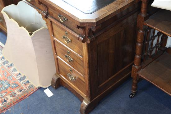 Attributed to Gillows. A Victorian gothic revival rosewood pedestal desk, W.4ft 8in. D.2ft 2in. H.2ft 5.5in.